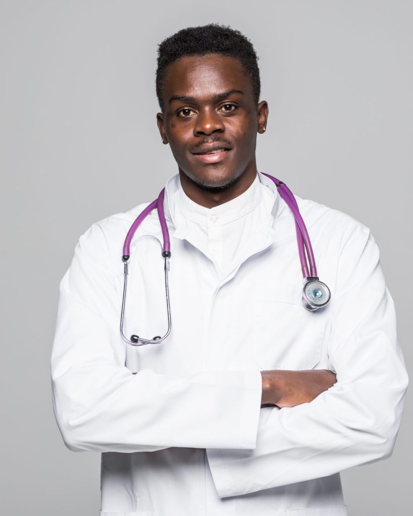 African-American black doctor man isolated white background.