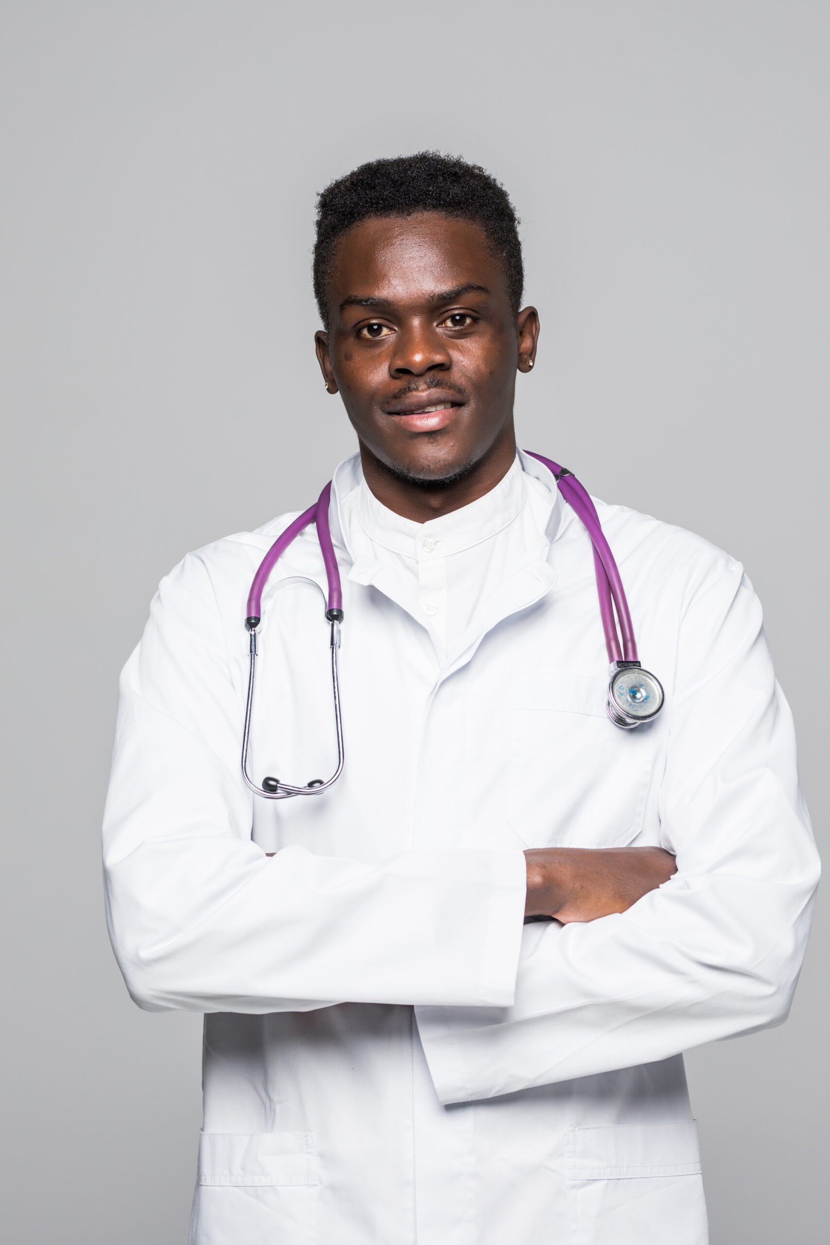 African-American black doctor man isolated white background.